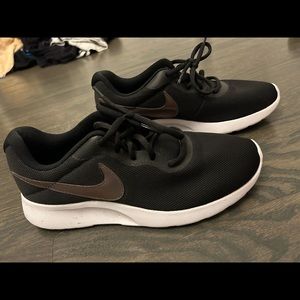 Black Nike running shoes